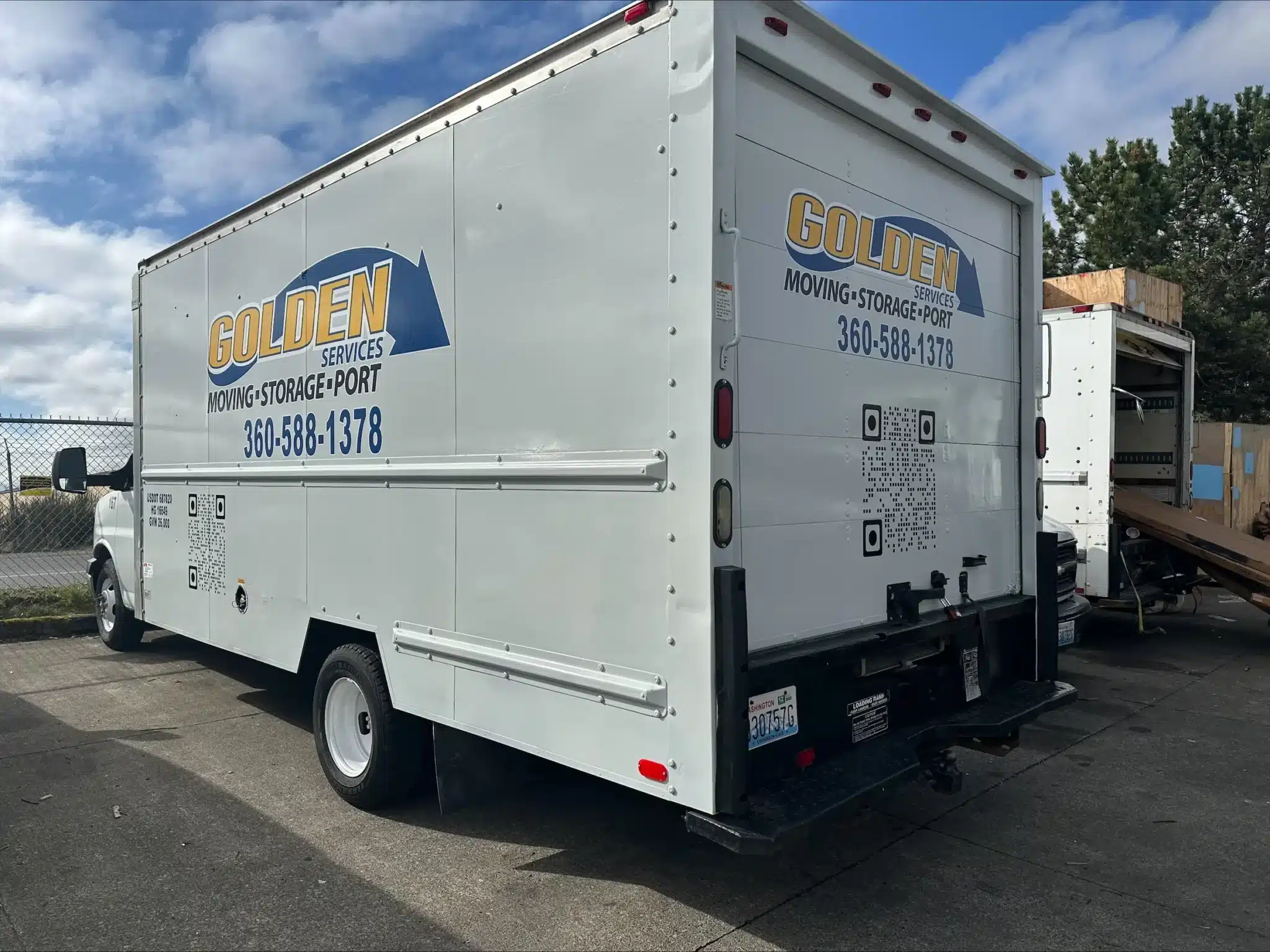 Golden Services LLC box truck parked and ready for local moving